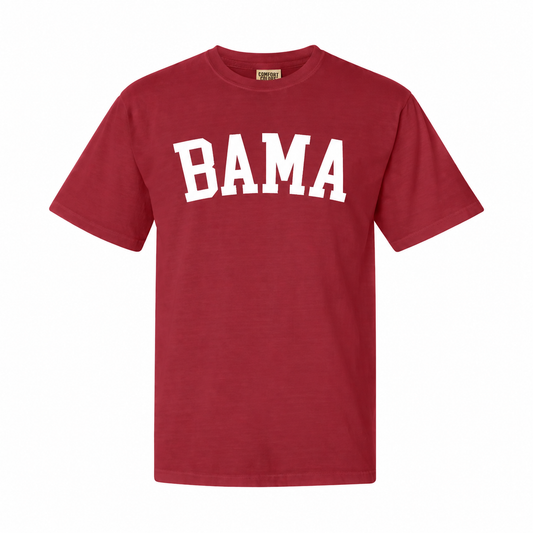 A short-sleeve crewneck t-shirt in maroon red with 'BAMA' printed across the chest in white varsity-style block letters, shown on a plain white background.