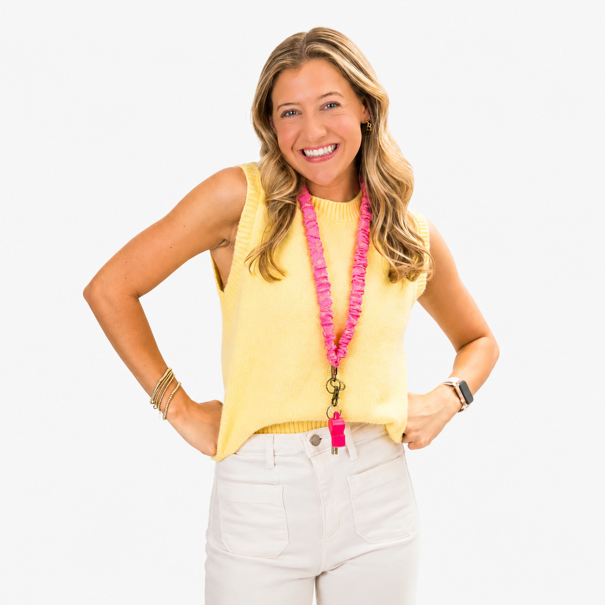 Model wearing a bright pink scrunchie lanyard with a yellow sun pattern and antique-brass-tone hardware.