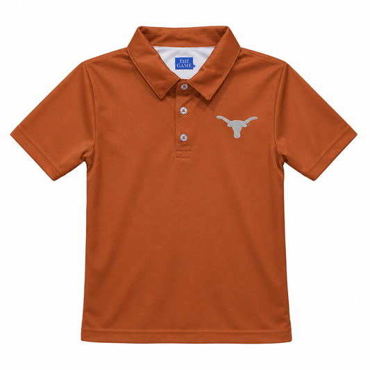 A burnt orange short-sleeve polo shirt with a three-button placket and a silver embroidered Longhorn logo on the left chest, displayed on a clean white background.