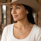 Hammered Texas necklace styled with a cowboy hat