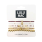 Five-piece Lulu Mac bracelet set with maroon and white beads and polished gold-tone accents.