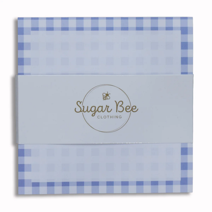 Lunch bag notes with a light blue gingham border and central writing area.