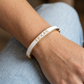 Texas bangle showing its white TEXAS side